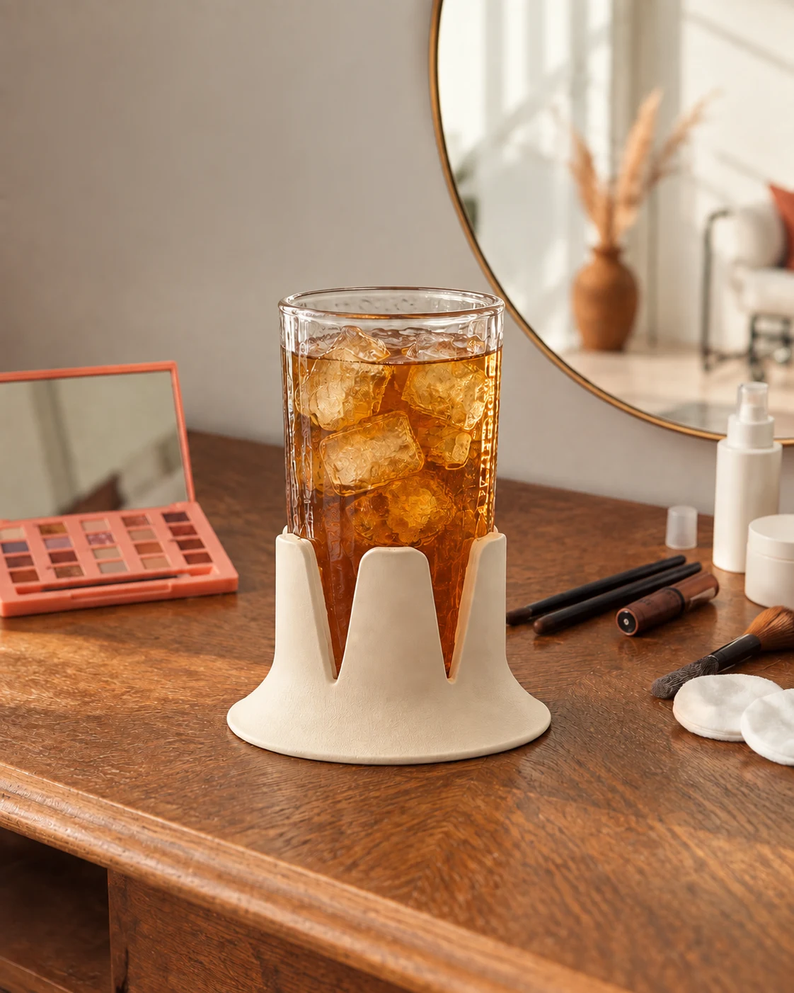 A glass of iced tea in a sand Steadi on a vanity. AI lifestyle illustration.